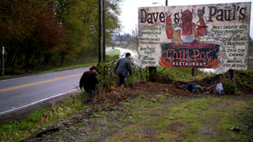 Kevin hid the demon tablet by burying it under the Devil billboard. Kevin hid the demon tablet by burying it under the Devil billboard.